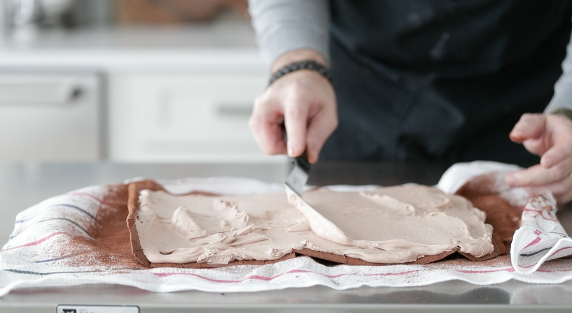 spreading filling onto a sheet cake