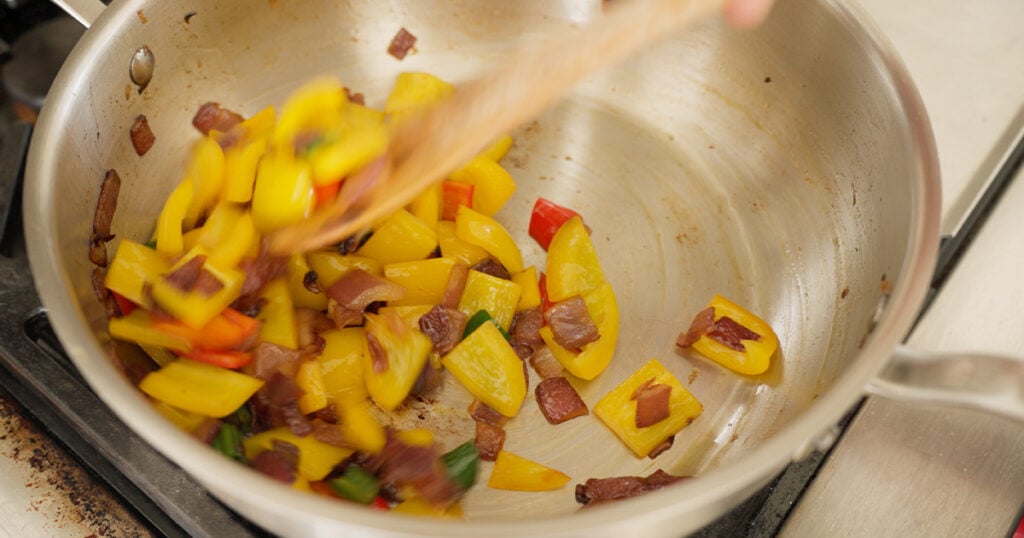 Peppers and onions in a pan