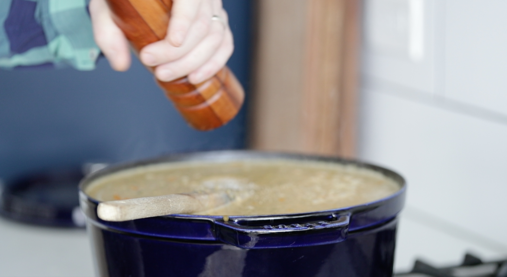 seasoning a pot of soup