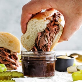 dipping a french dip into au jus