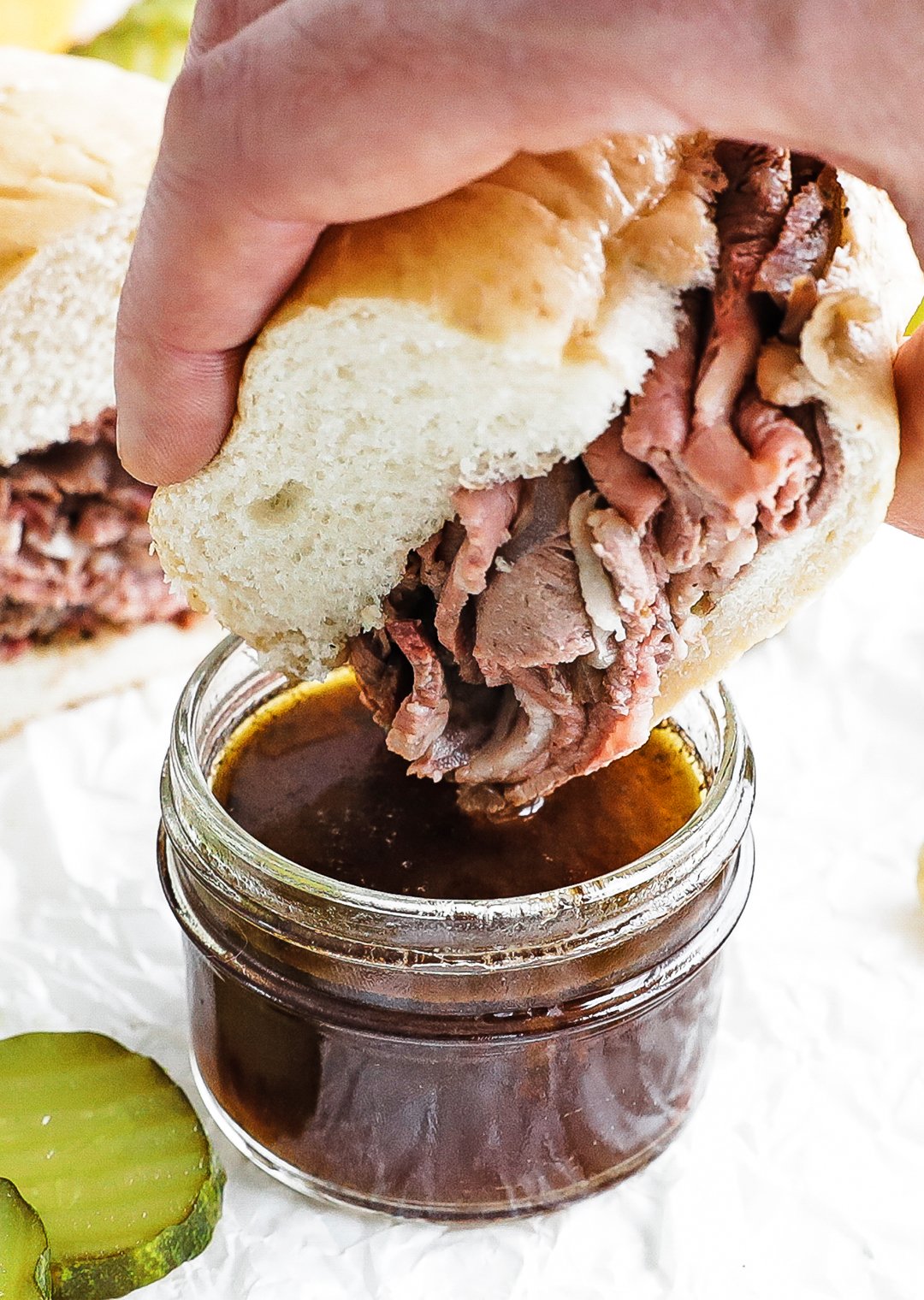 dipping a french dip into au jus