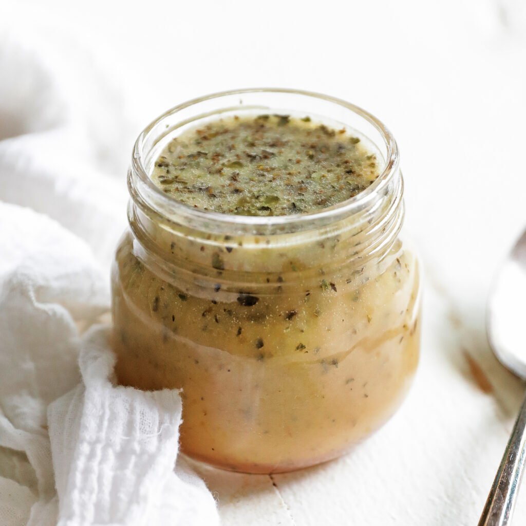 small jar of greek salad dressing