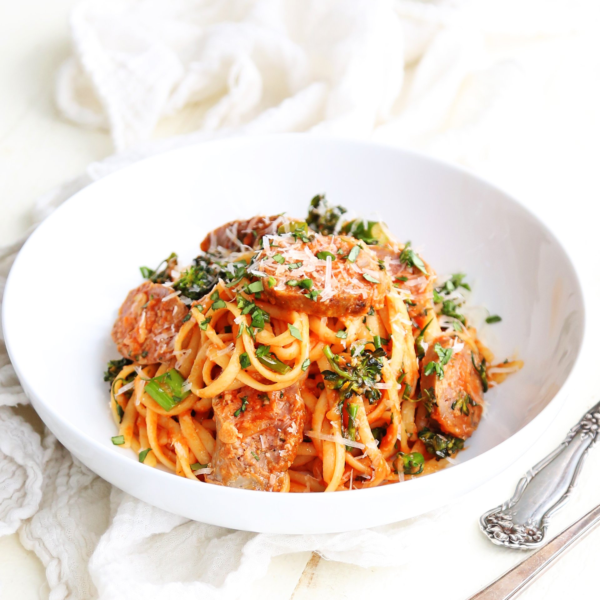 bowl of tomato pasta and sausage