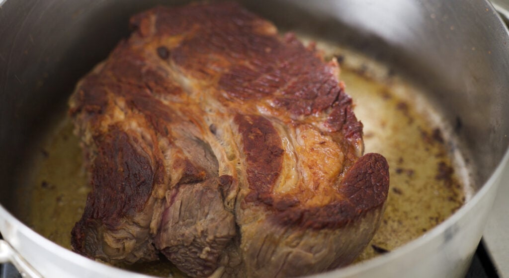 browned beef in a pot