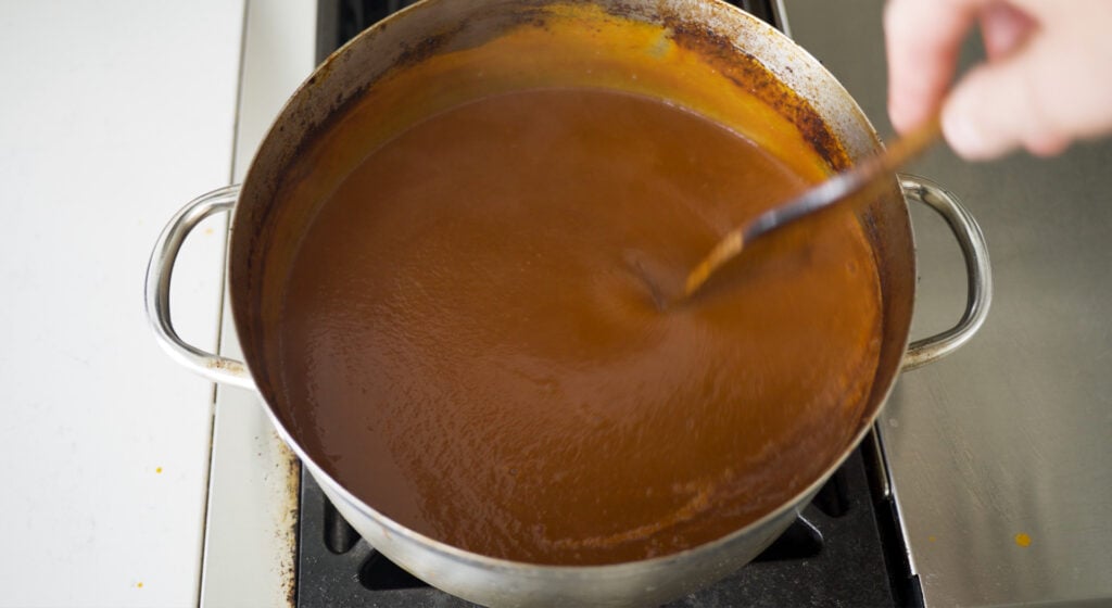 Close up of smooth sauce in a pot