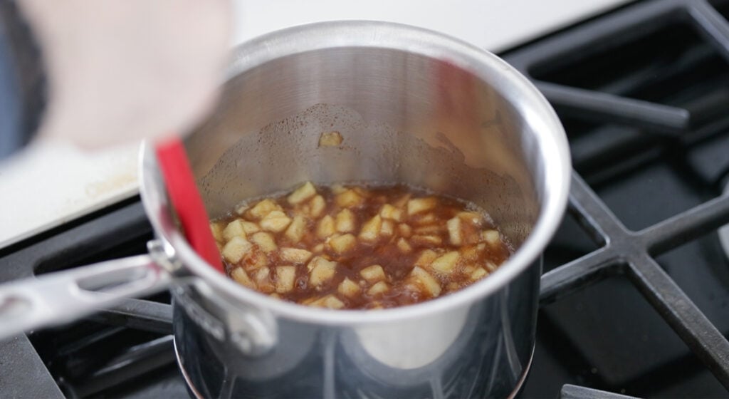 cooking the mixture in a pot