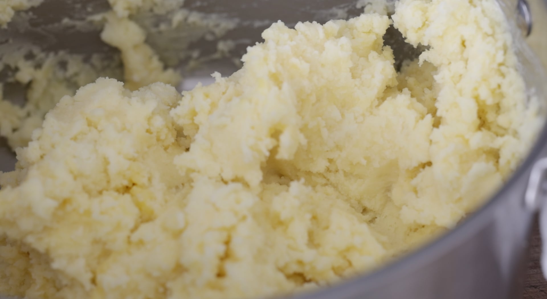 mixing potatoes with eggs and milk