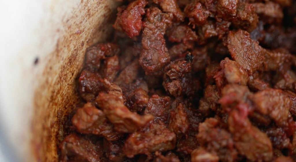 Pince the tomato paste