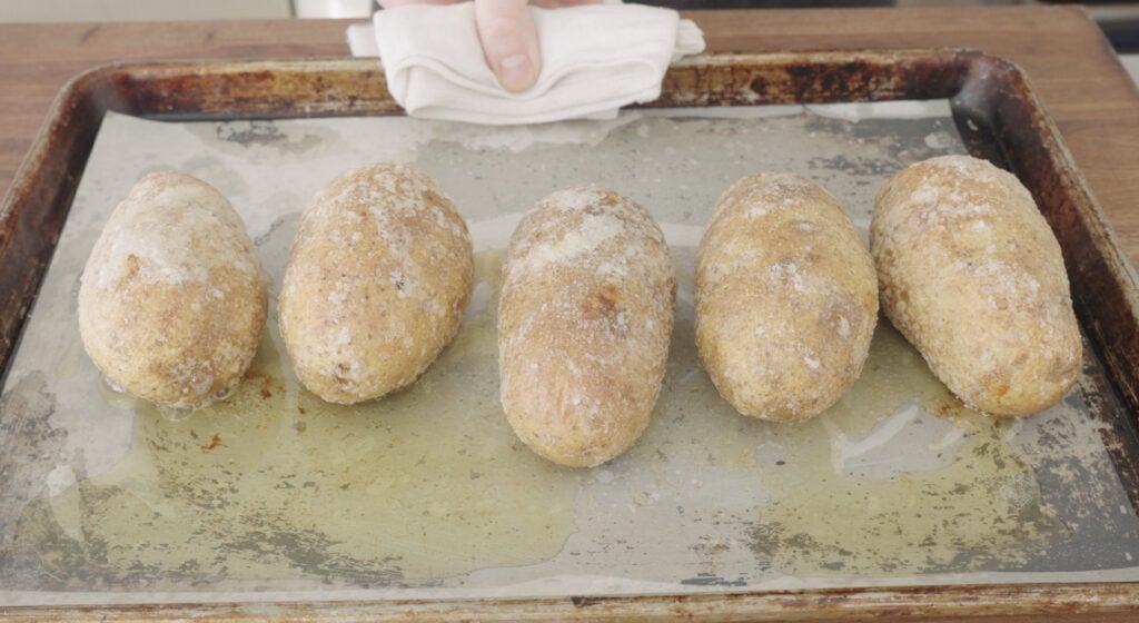cooked potatoes on a sheet tray