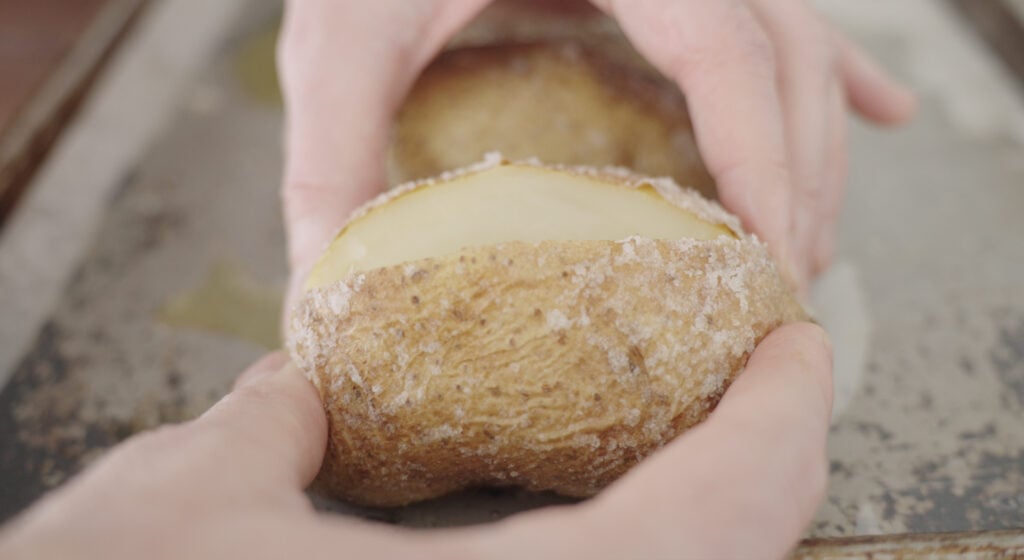 a potato that has been sliced open at the top