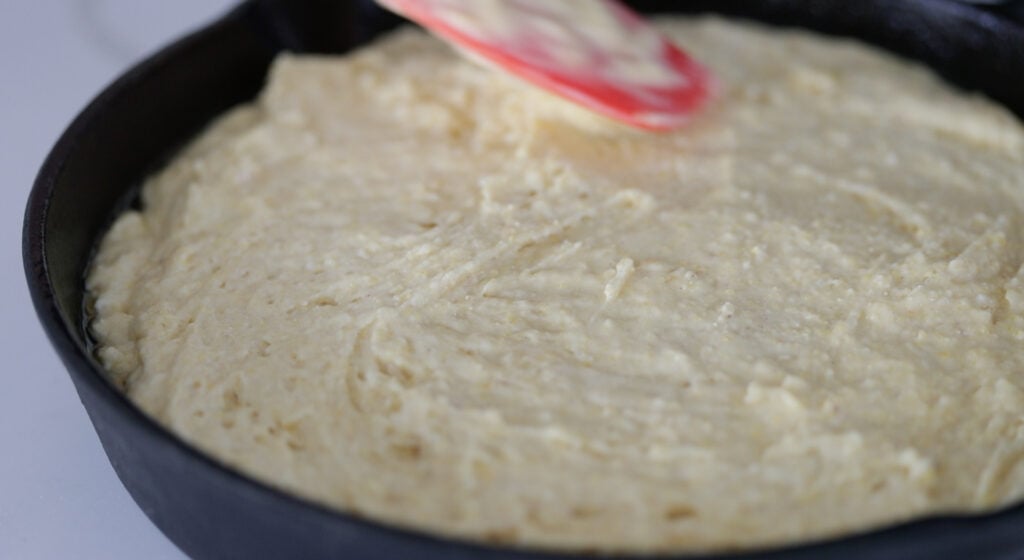 use a spatula to spread the batter