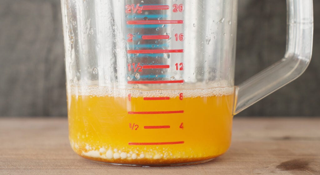 Melted butter in a large container