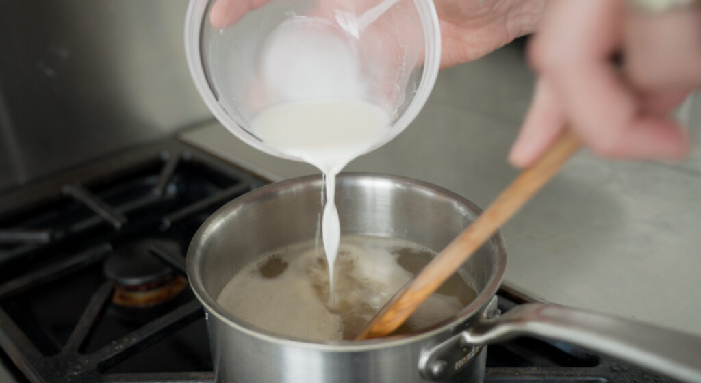 bowl containing slurry being poured into the pan