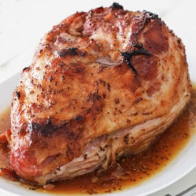whole glaze ham on a platter