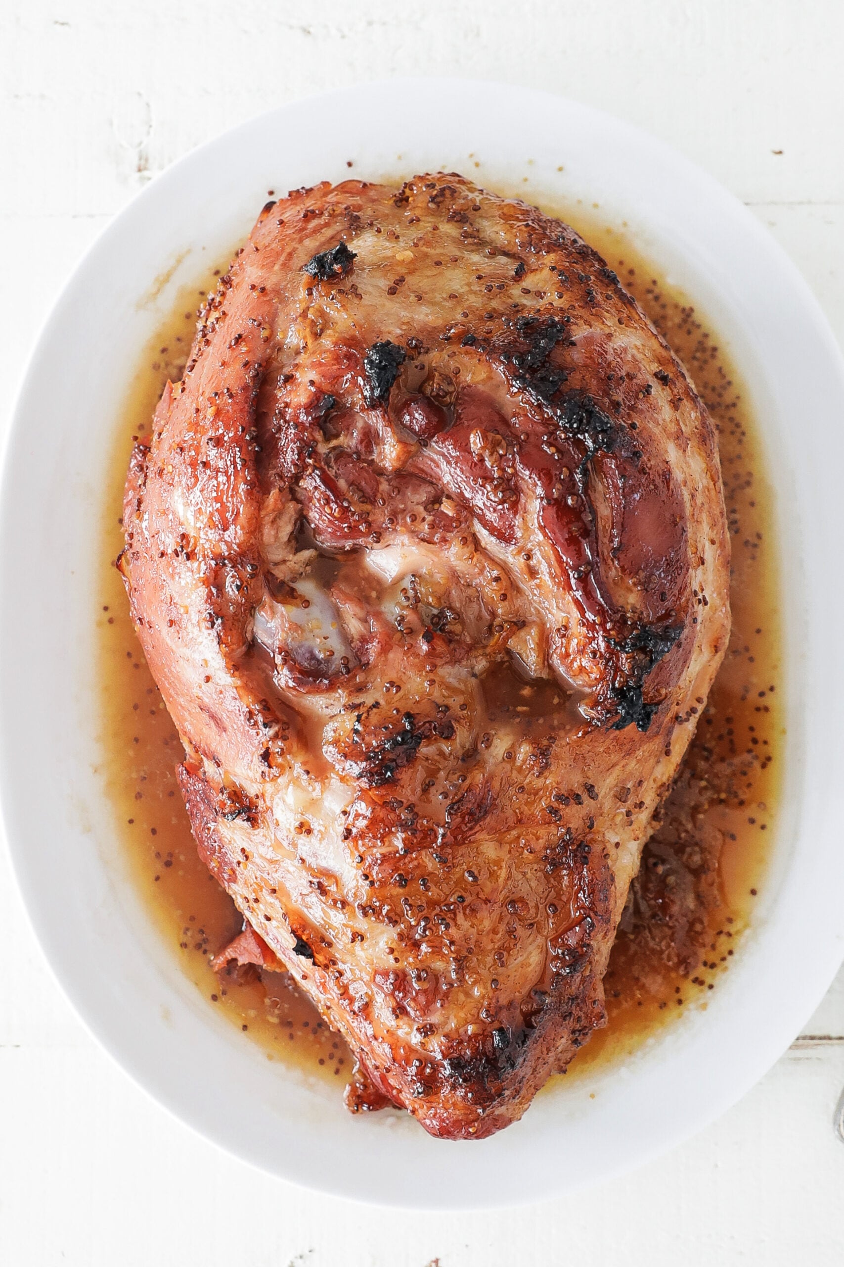 whole glazed ham recipe on a platter