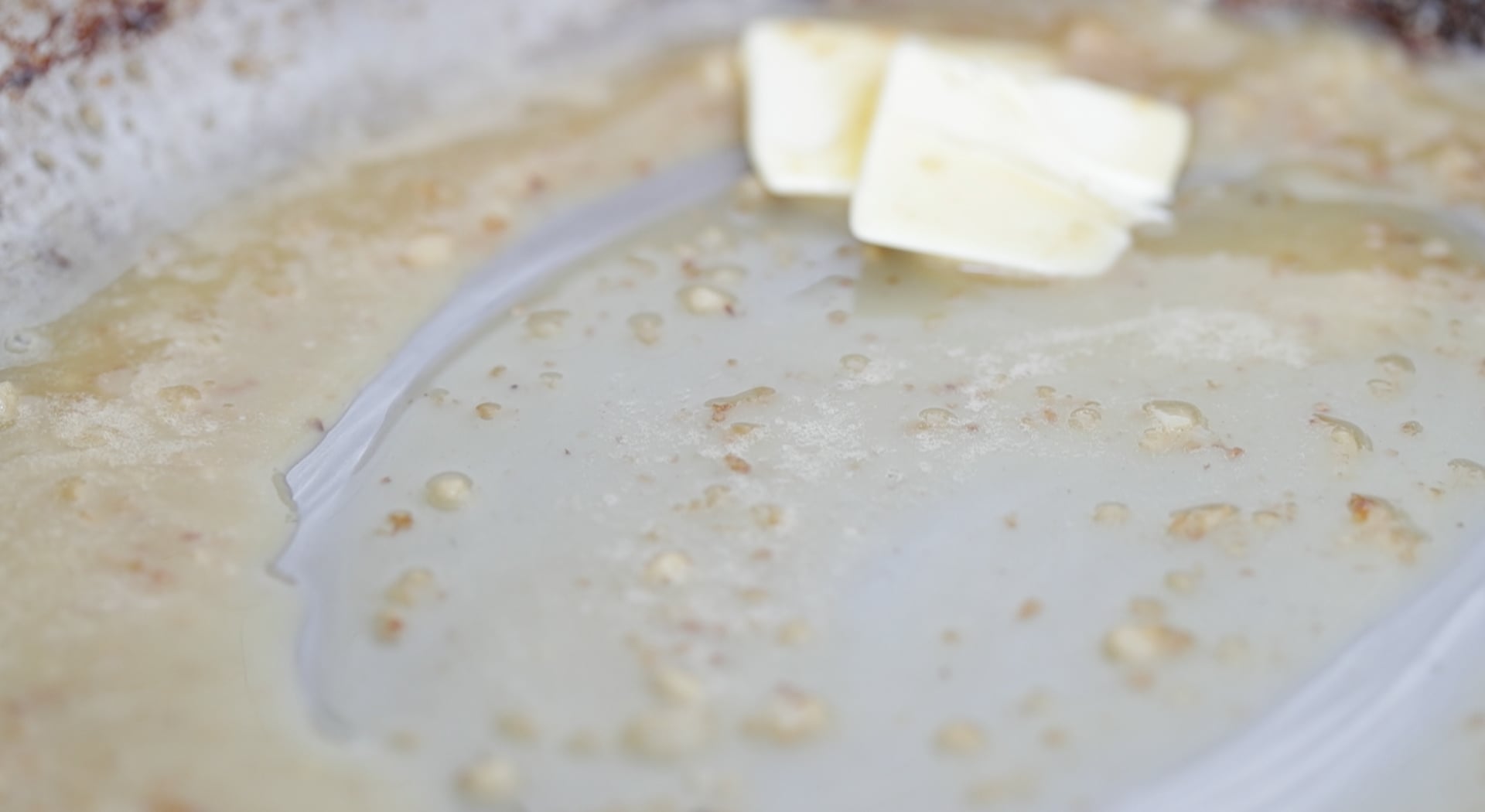 making a butter sauce in a pan