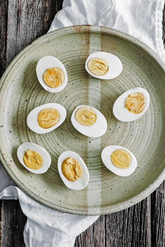 plate of hard boiled eggs cut in half