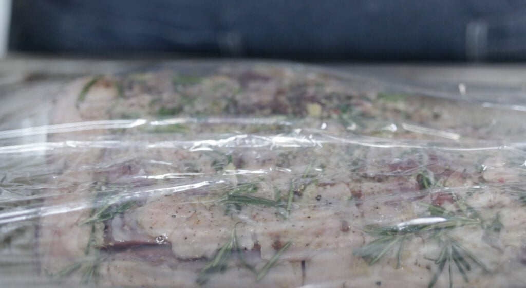 wrapping a leg of lamb in plastic wrap