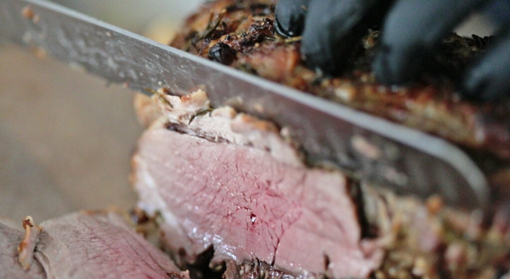 slicing leg of lamb