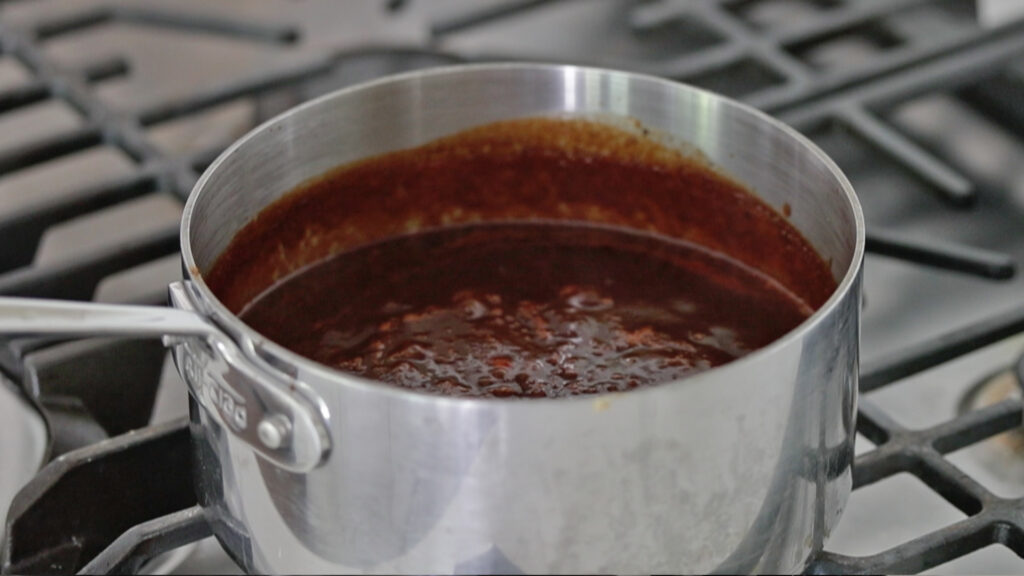 simmering a homemade bbq sauce