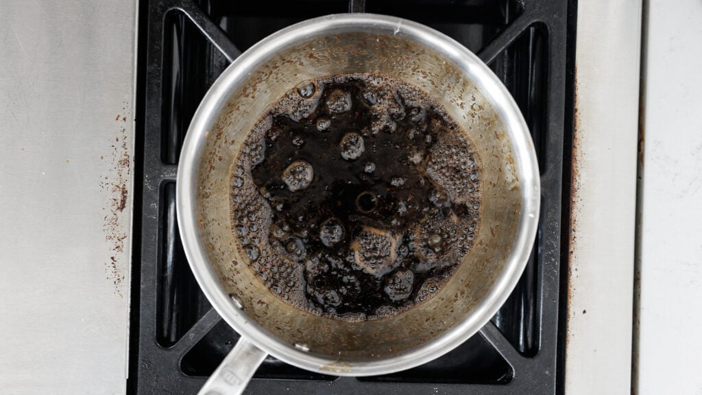 cooking the glaze in a pan