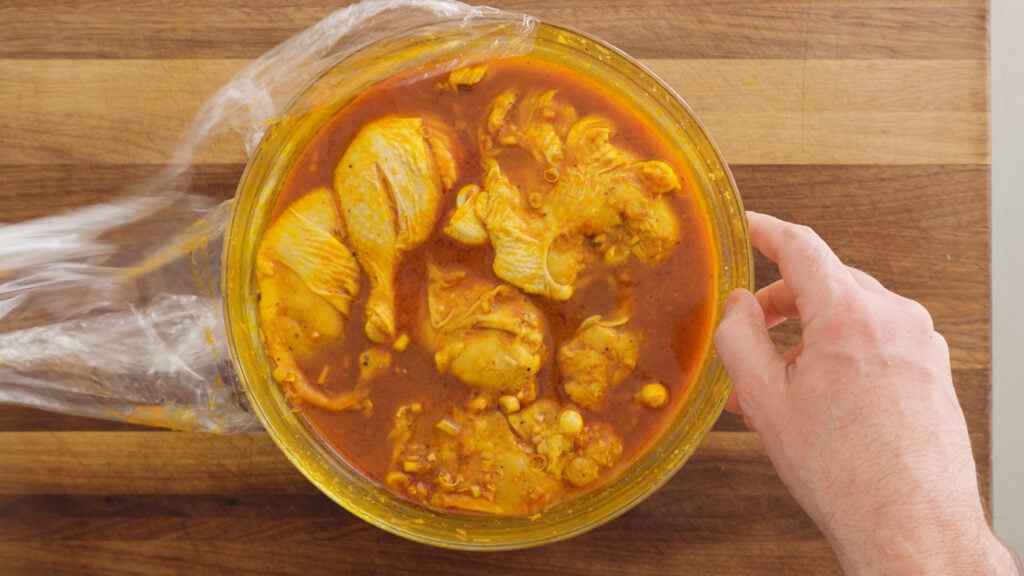 Chicken pieces completely coated in the marinade