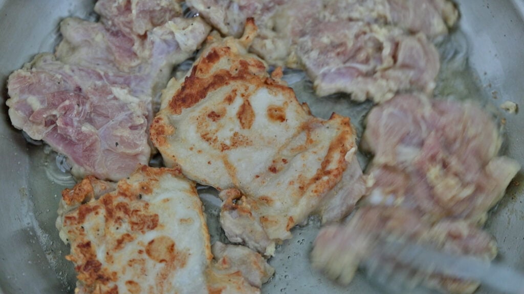 pan searing the chicken