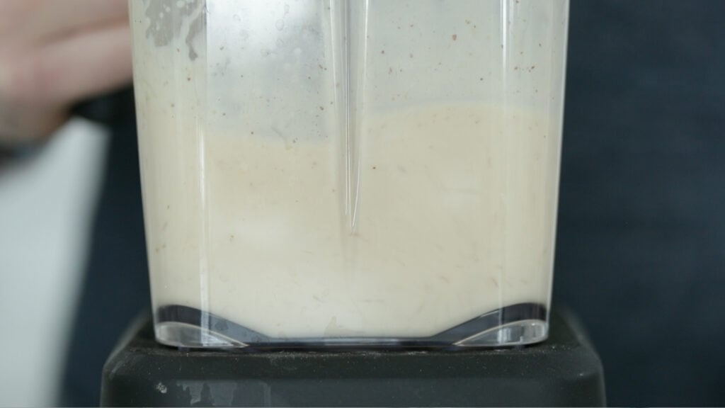 blending a salad dressing in a blender