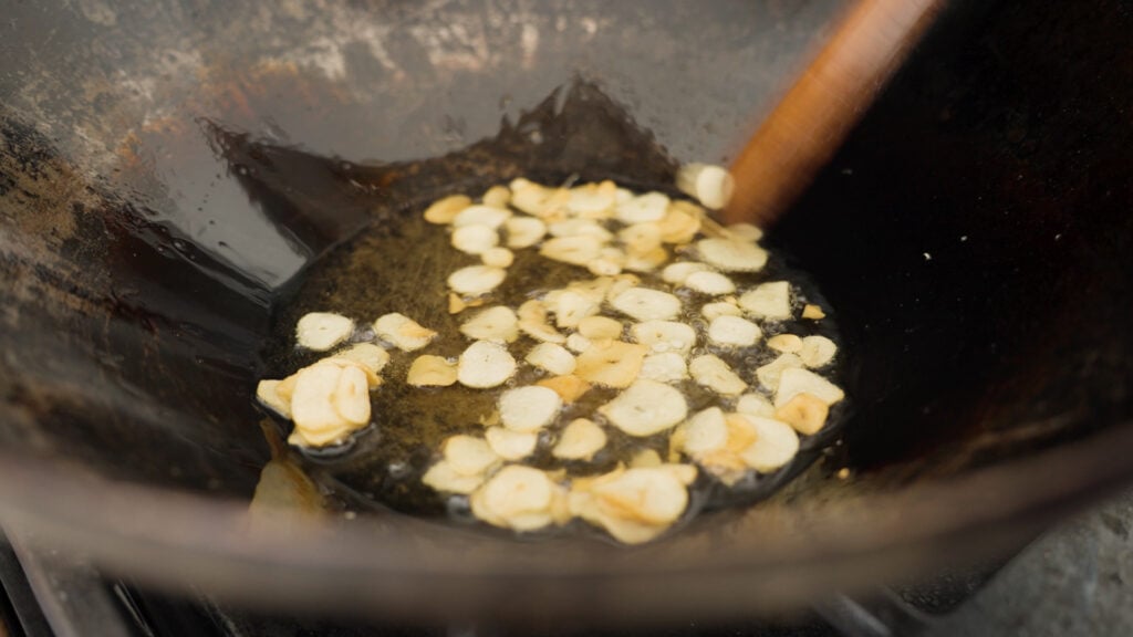 Frying garlic in pan 