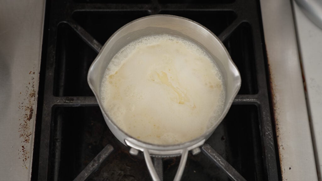 heavy cream and butter in a Saucepan on the stove
