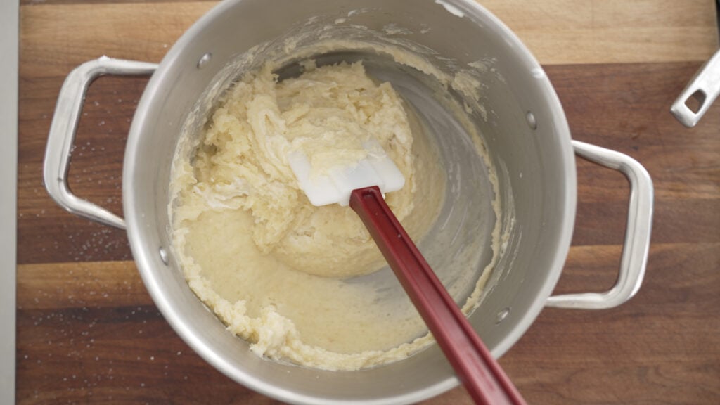 Stirring the potatoes with a spatula