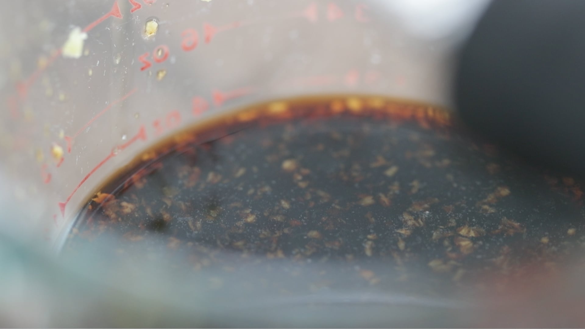 whisking a honey and soy sauce together