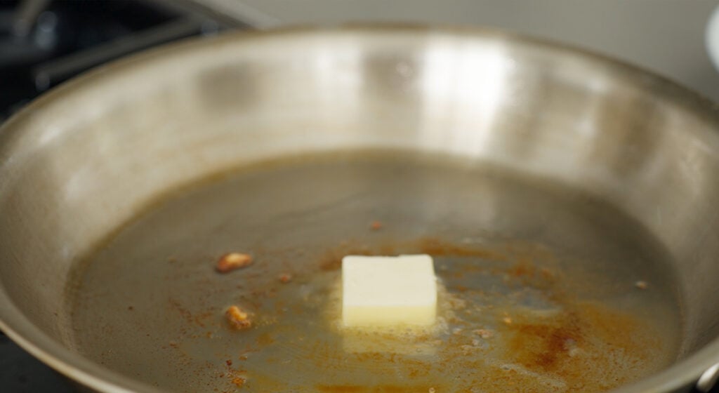 Butter melting in a pan