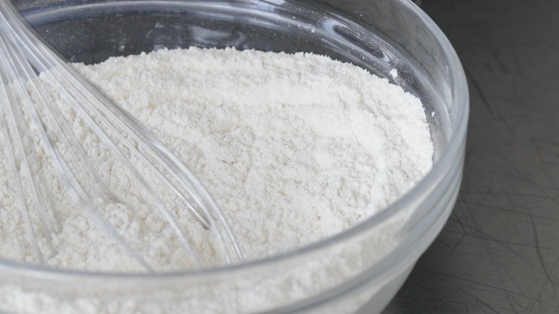 whisking flour