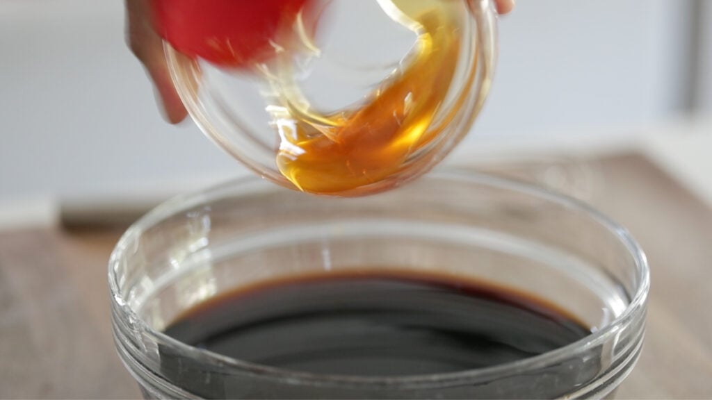 adding honey to teriyaki sauce