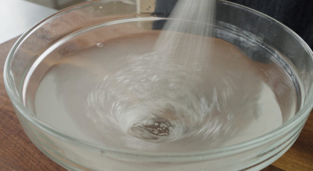 whisking ingredients in a bowl