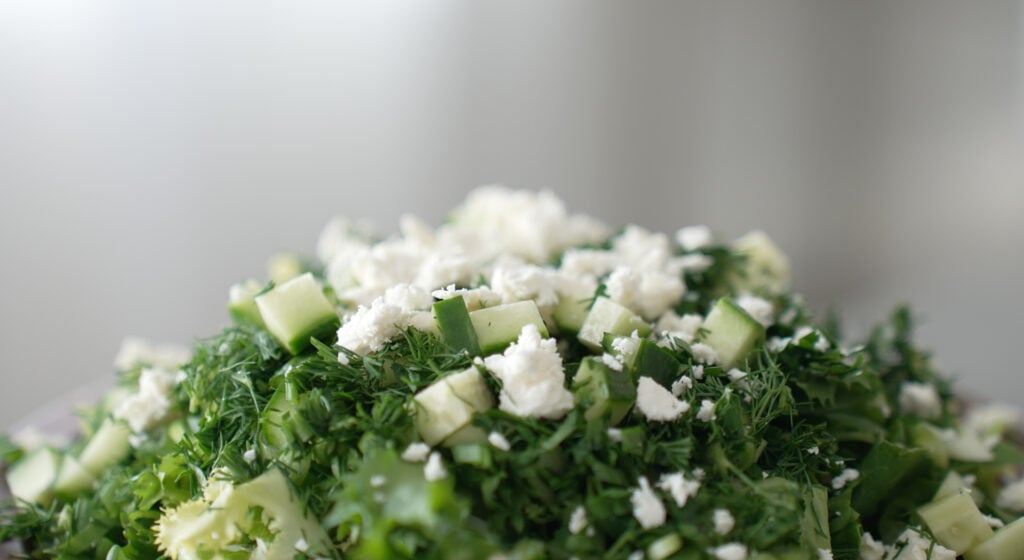 maroulosalata with white cheese crumbled on top