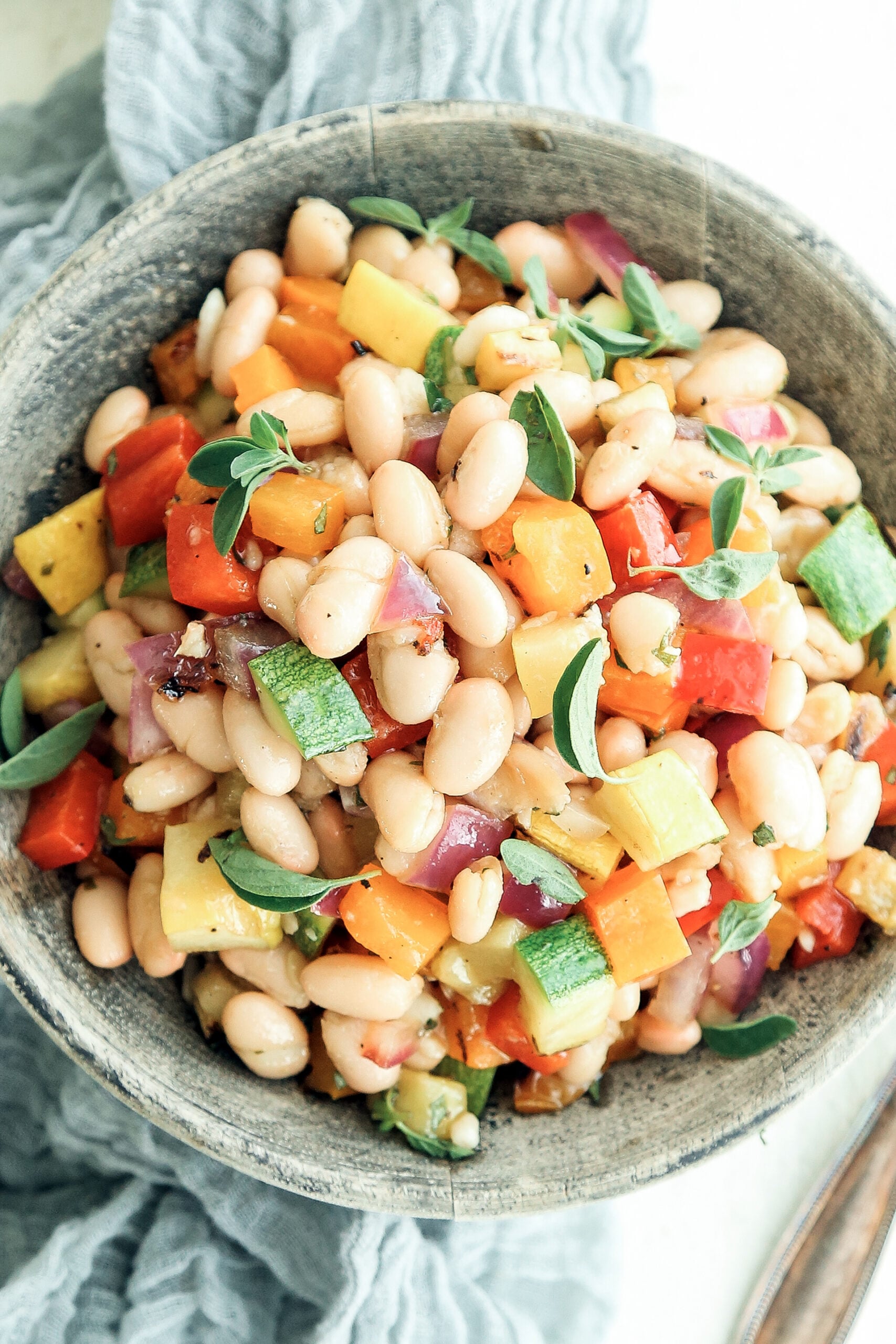 mediterranean bean salad with roasted vegetables and herbs