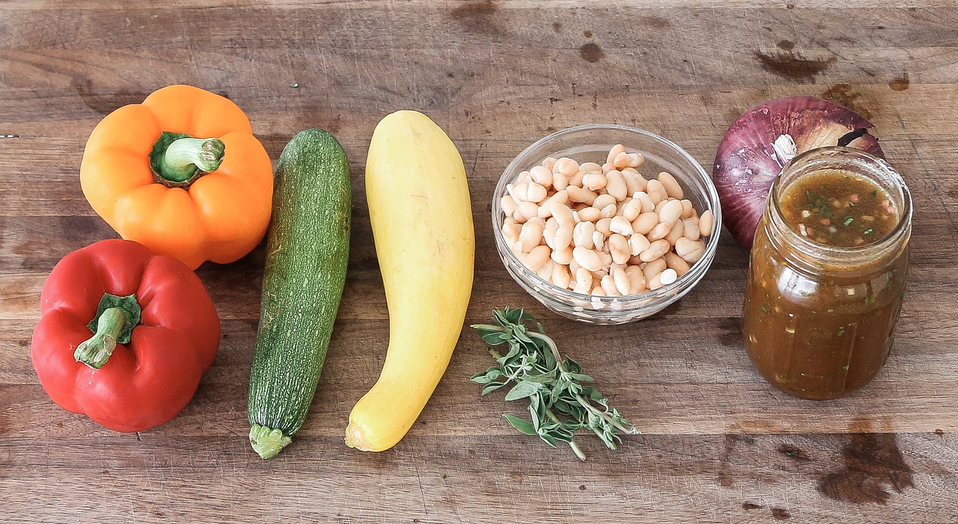 ingredients to make a Mediterranean bean salad