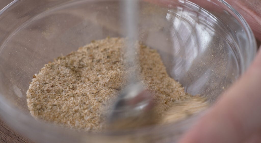 spoon mixing ingredients together