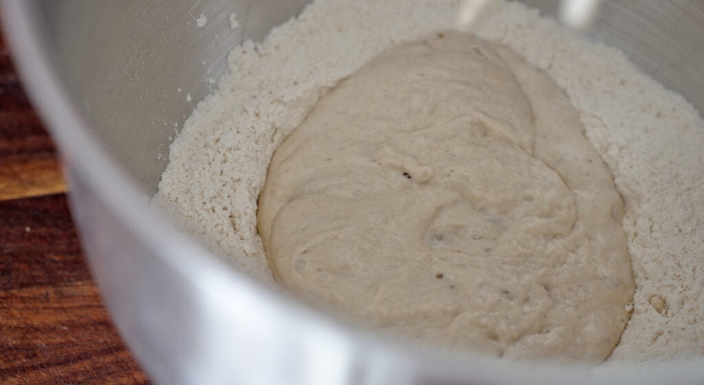 Poolish added to the dry ingredients in the mixer