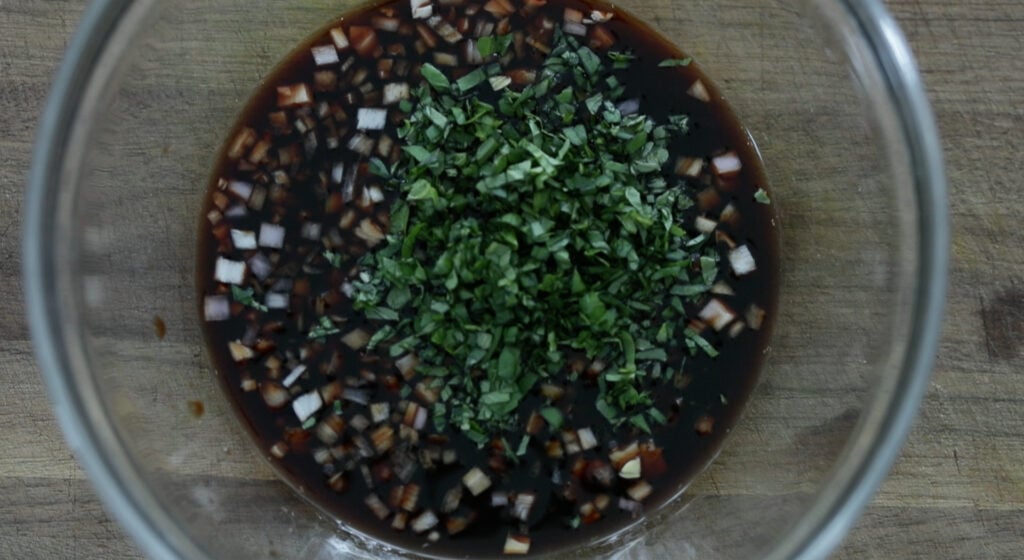mustard, chopped basil and shallots in a bowl