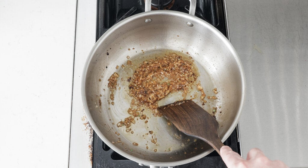 Browning shallots and garlic in a pan