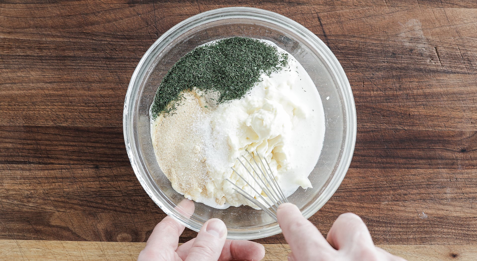 mixing ranch dressing in a bowl