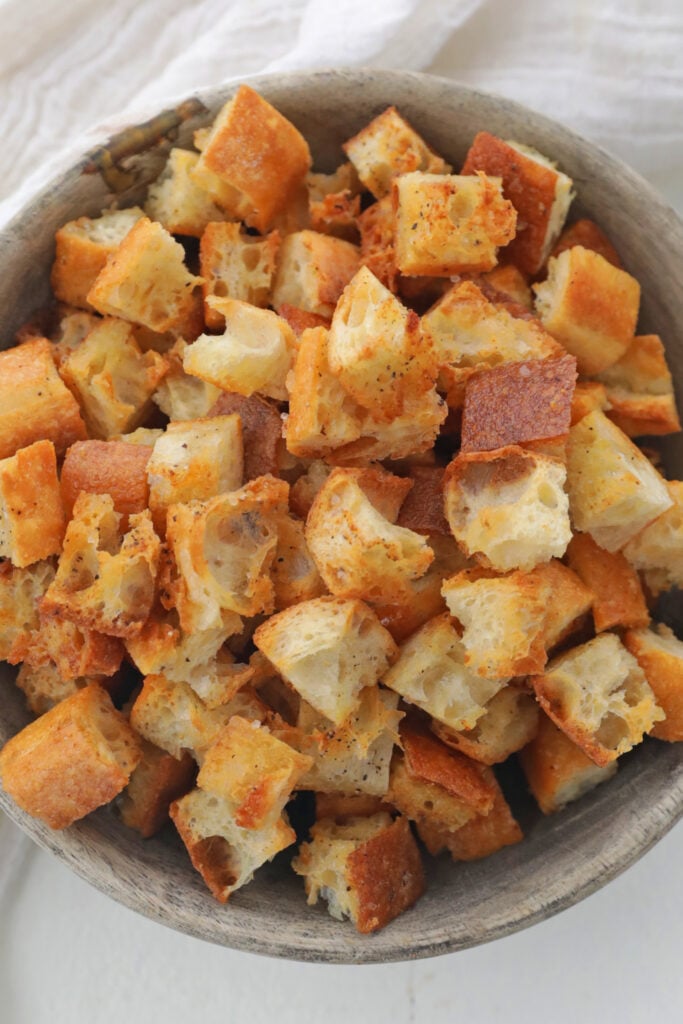 bowl of crunchy brown croutons