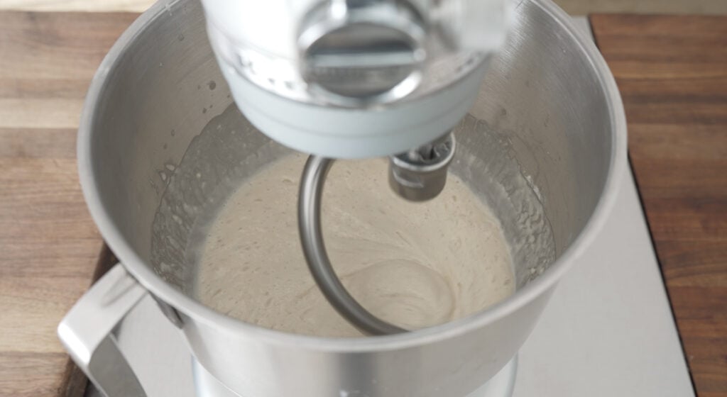 Mixer combining ingredients.
