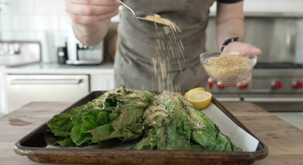 Adding breadcrumbs to the grilled. 