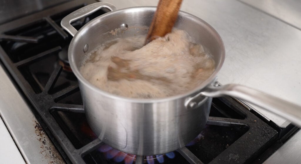 a pot simmering on the stove