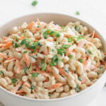 Hawaiian macaroni salad in a white serving bowl