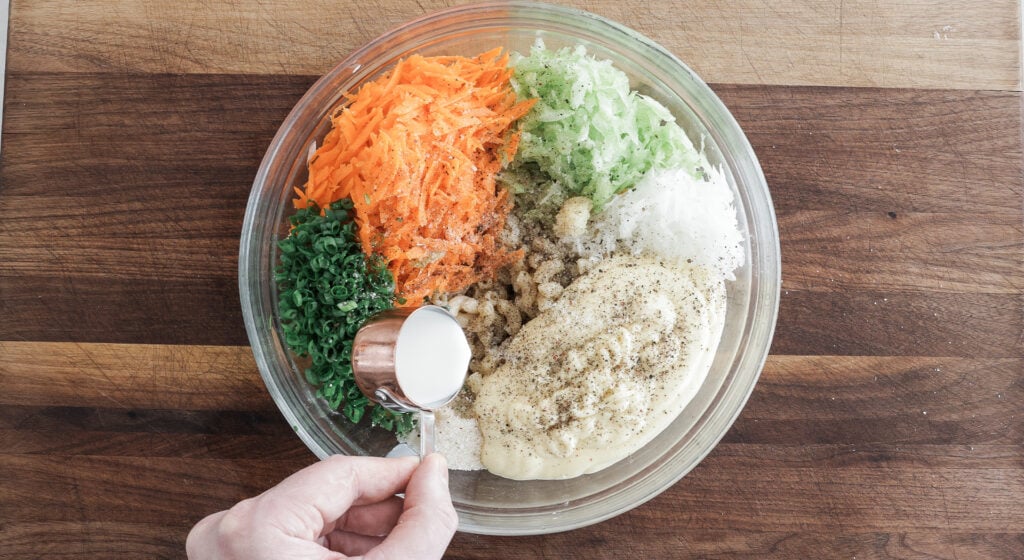 a large glass bowl containing all of the ingredients added separately